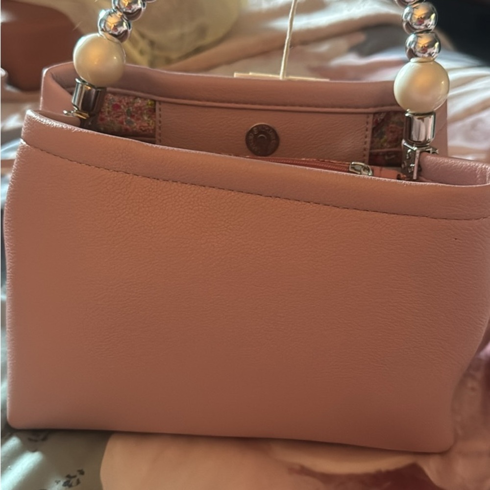 Elegant Pink Handbag with Pearl Accents